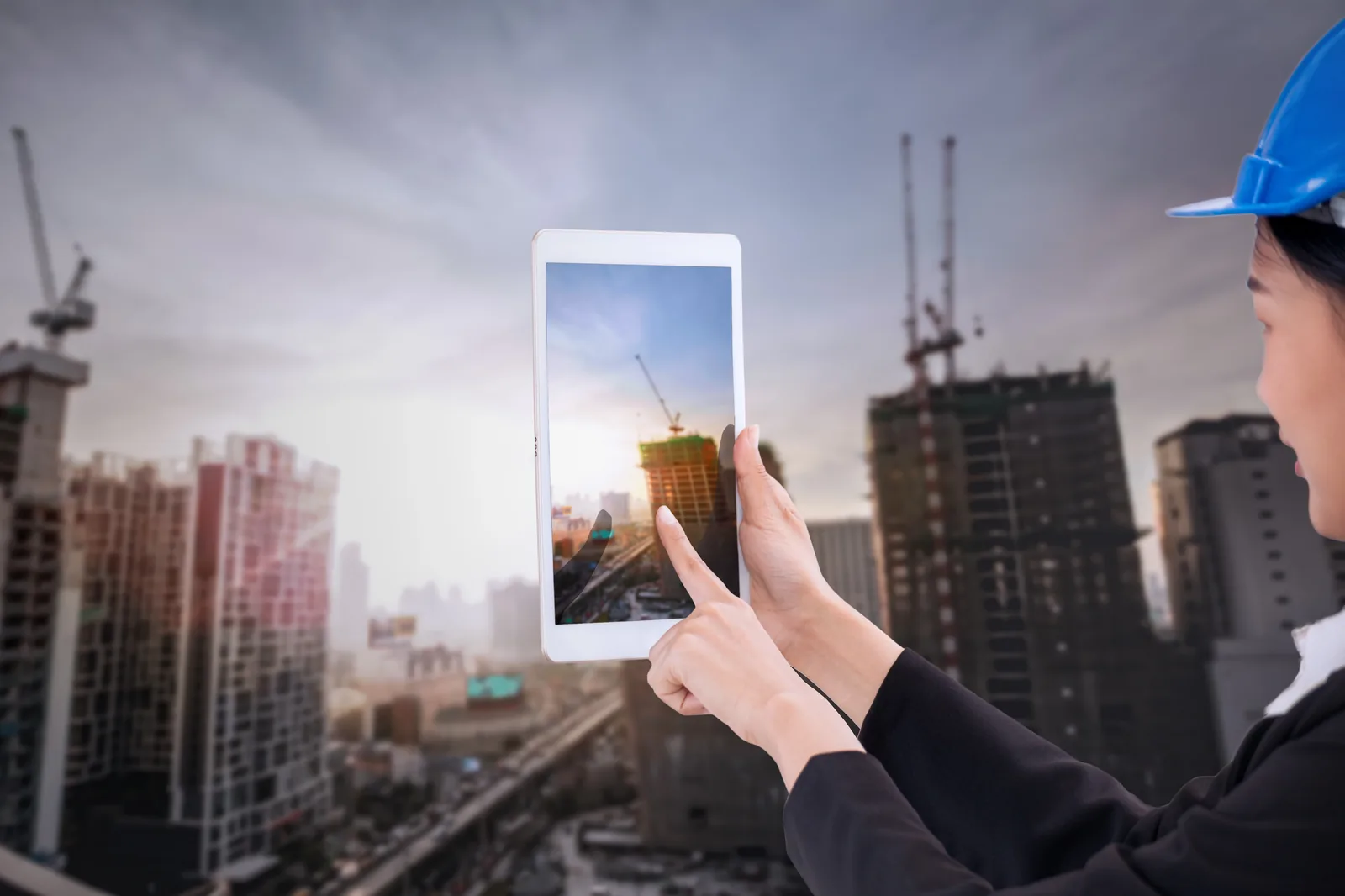 Engineer using a tablet for capacity study and infrastructure planning